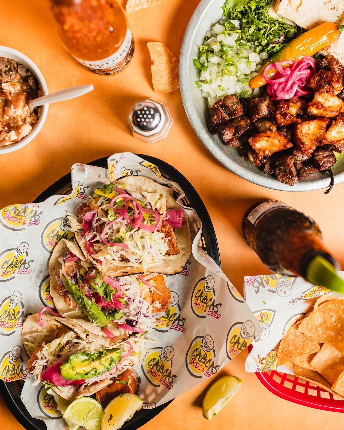 Tacos on custom printed wax paper for Calacas