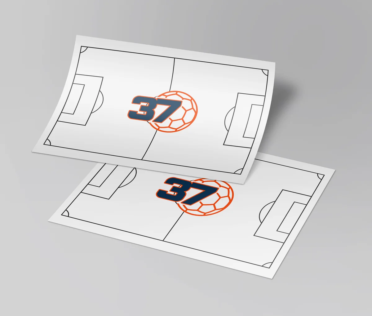 Two printed sheets with a soccer field and the 37 logo, mockup